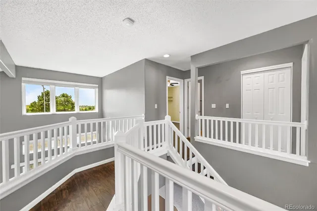 a view of staircase with large window