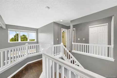a view of staircase with large window