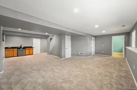 a kitchen with stainless steel appliances a stove and a refrigerator