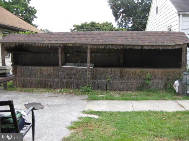 3800 12th Marcus Hook, PA 19061 - Photo 14 of 17 a front view of a house with a yard