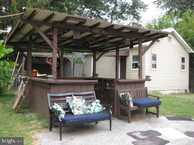 3800 12th Marcus Hook, PA 19061 - Photo 15 of 17 a view of a chairs and a tables in the patio