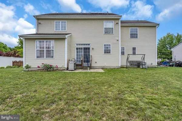 a front view of house with yard