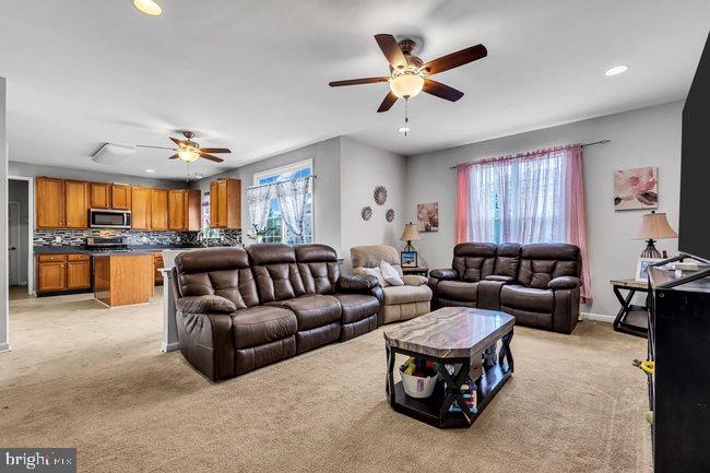 30 Homestead Drive Pemberton, NJ 08068 - Photo 28 of 51 a living room with furniture kitchen view and a large window
