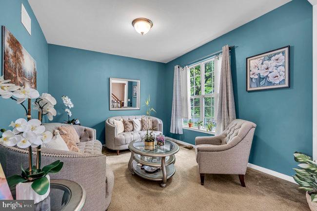 30 Homestead Drive Pemberton, NJ 08068 - Photo 30 of 51 a living room with furniture and a large window