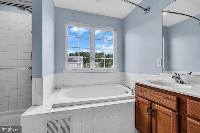 30 Homestead Drive Pemberton, NJ 08068 - Photo 32 of 51 a bathroom with a bathtub and a sink