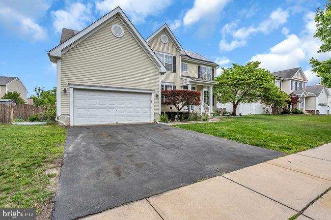 30 Homestead Drive Pemberton, NJ 08068 - Photo 6 of 51 a front view of house with yard and green space