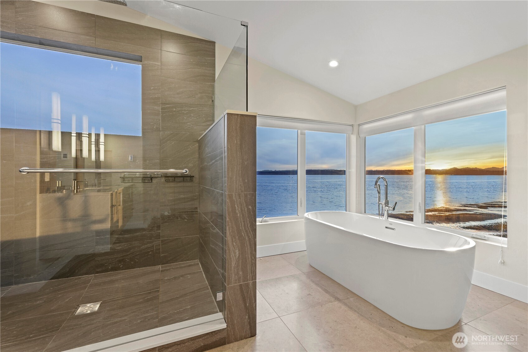 12065 30th Avenue Southwest Burien, WA 98146 - Photo 15 of 40 a bathroom with a bathtub and a shower