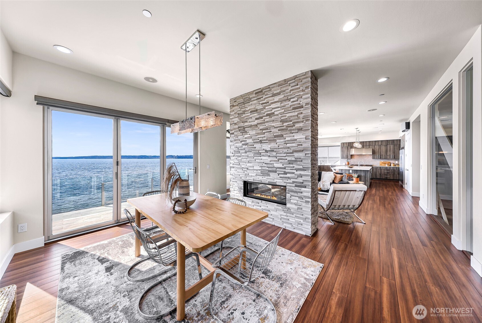 12065 30th Avenue Southwest Burien, WA 98146 - Photo 5 of 40 a living room with furniture wooden floor and a fireplace