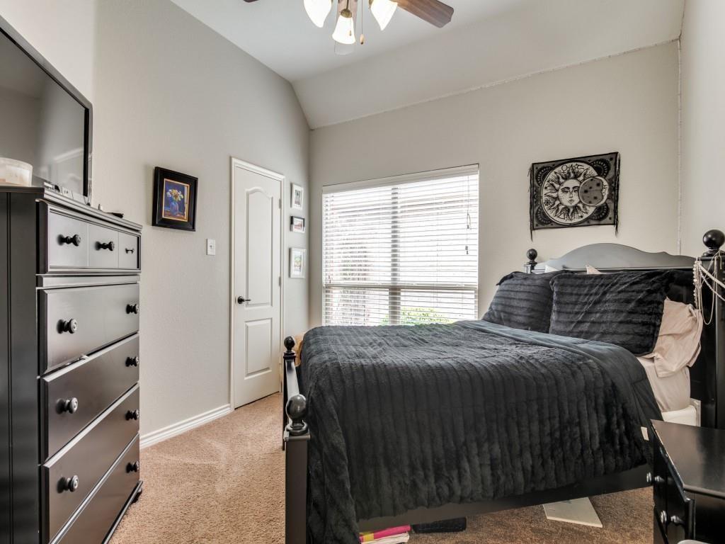 9962 Bell Rock Road Frisco, TX 75035 - Photo 22 of 28 a bedroom with a bed and a window