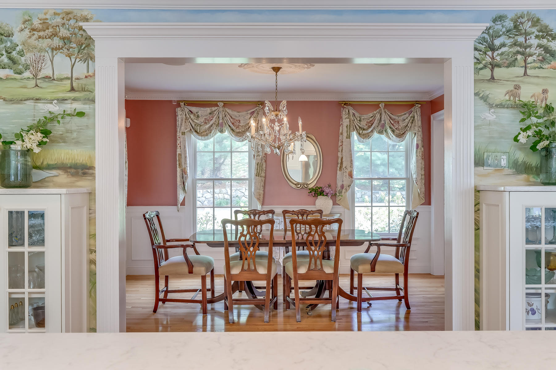 117 Wild Goose Way Centerville, MA 02632 - Photo 11 of 51 a view of a dining room with furniture large windows and wooden floor