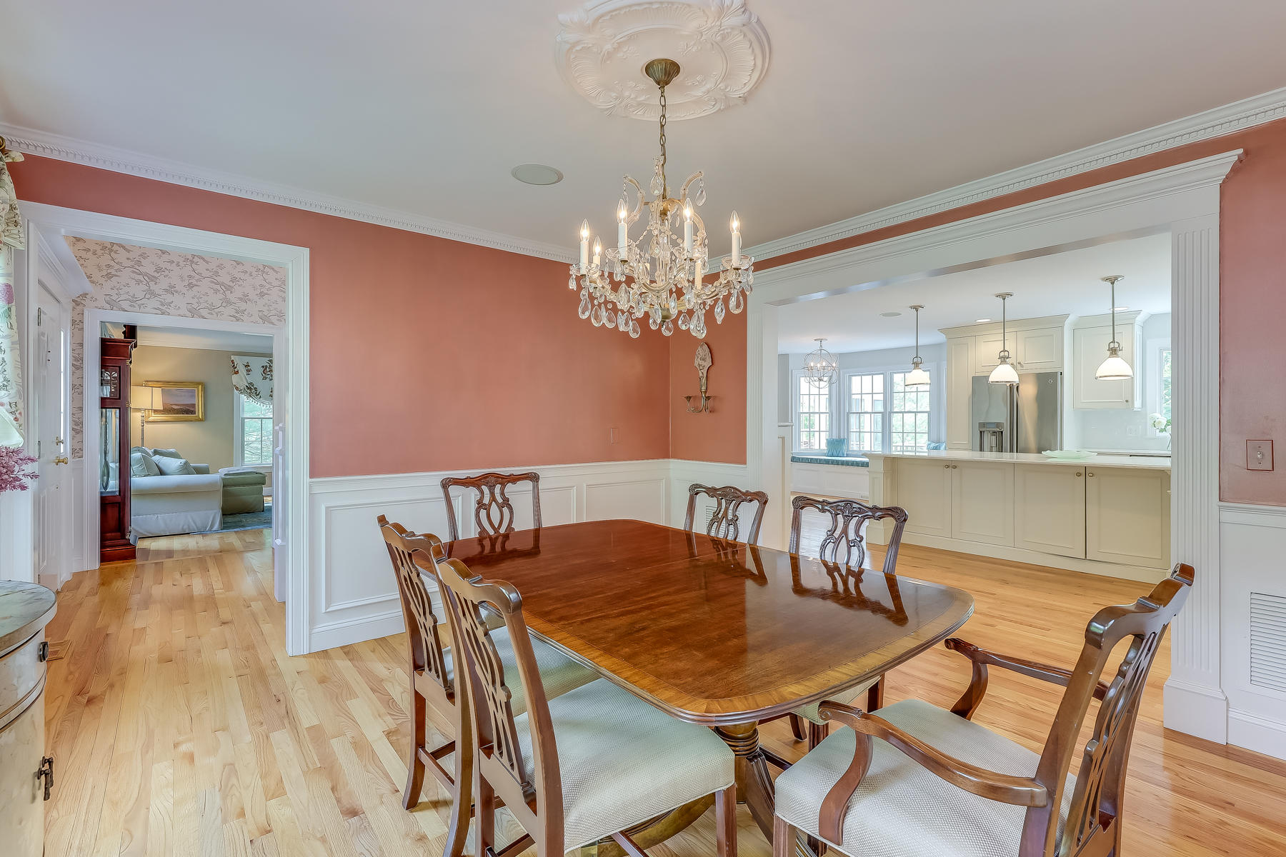 117 Wild Goose Way Centerville, MA 02632 - Photo 12 of 51 a view of a dining room with furniture and chandelier