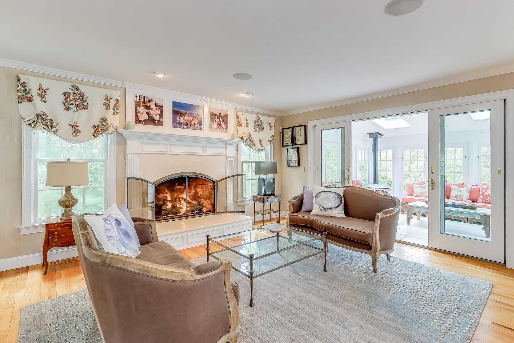 117 Wild Goose Way Centerville, MA 02632 - Photo 15 of 51 a living room with furniture and a fireplace