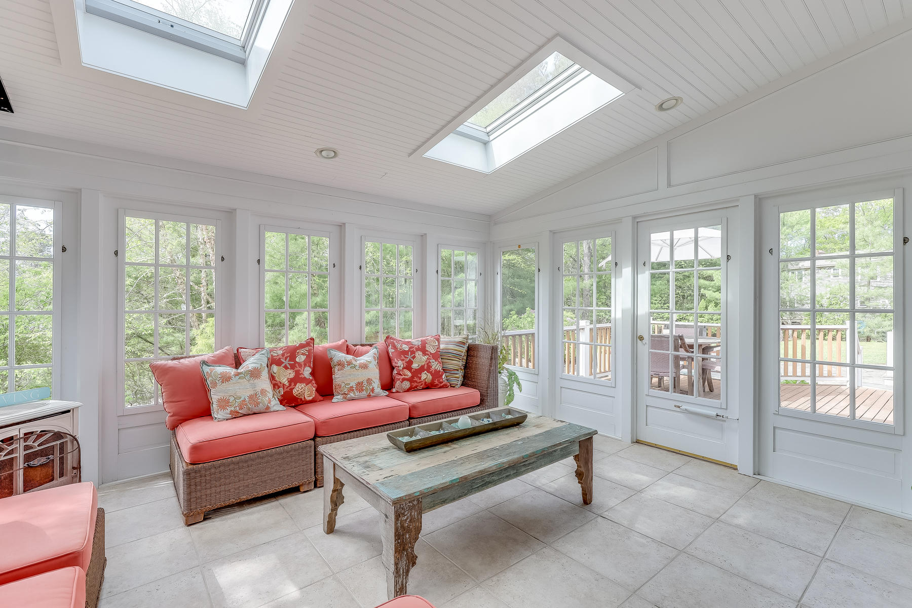 117 Wild Goose Way Centerville, MA 02632 - Photo 19 of 51 a living room with furniture and a floor to ceiling window