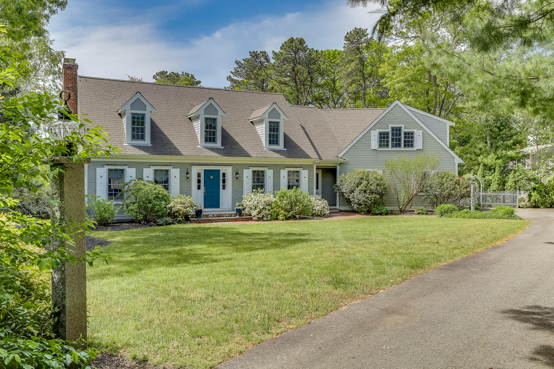 117 Wild Goose Way Centerville, MA 02632 - Photo 2 of 51 a front view of a house with a yard