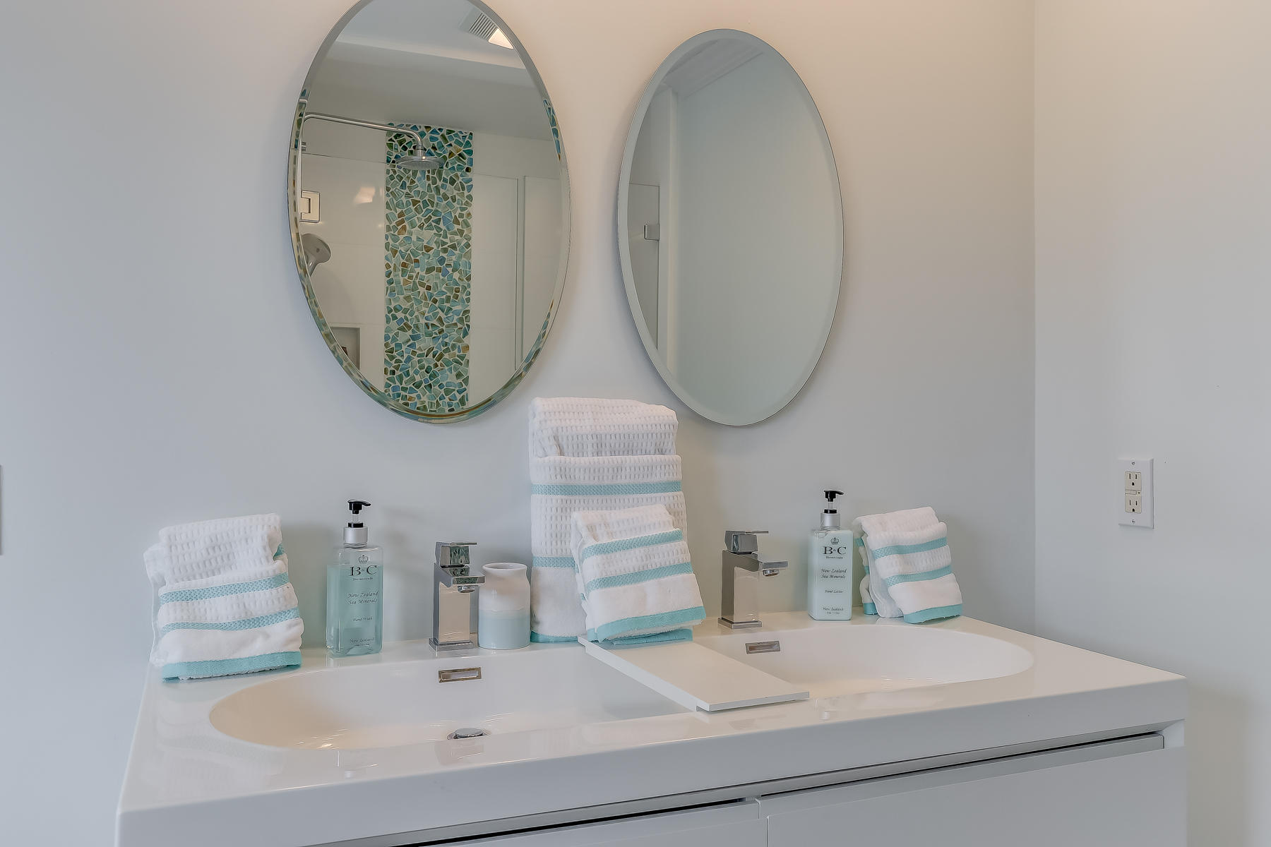117 Wild Goose Way Centerville, MA 02632 - Photo 27 of 51 a bathroom with a sink and a mirror