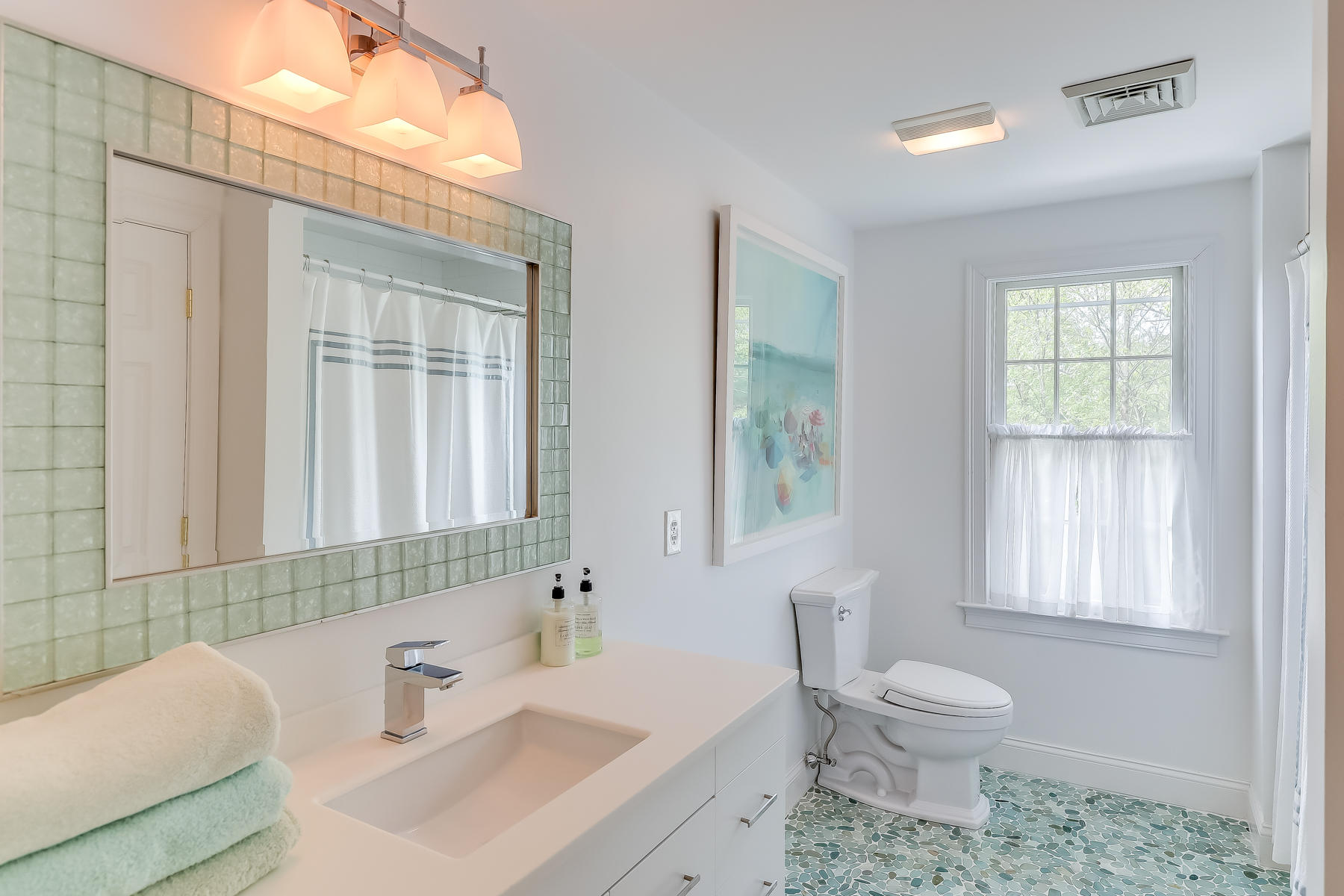 117 Wild Goose Way Centerville, MA 02632 - Photo 31 of 51 a bathroom with a sink toilet and shower