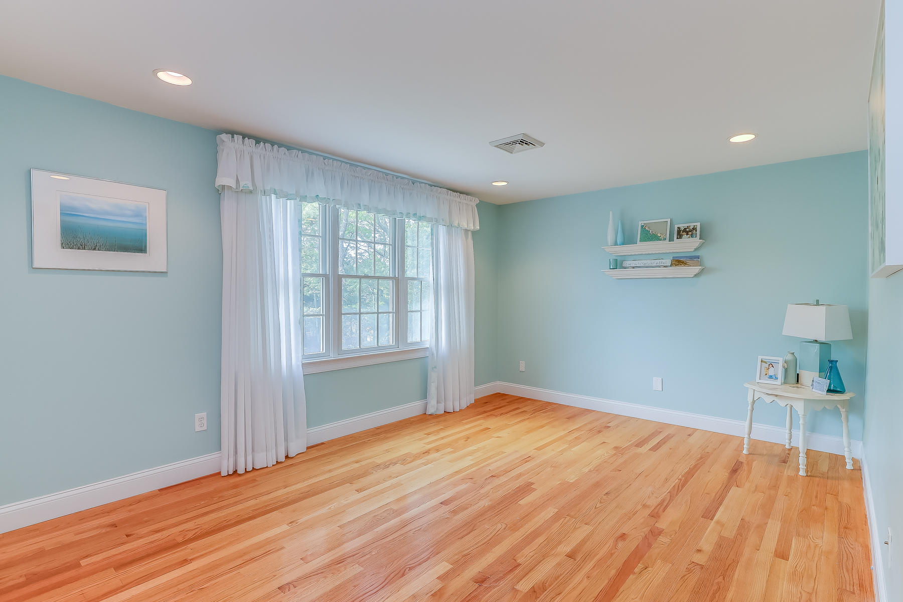 117 Wild Goose Way Centerville, MA 02632 - Photo 34 of 51 a view of empty room with wooden floor and fan