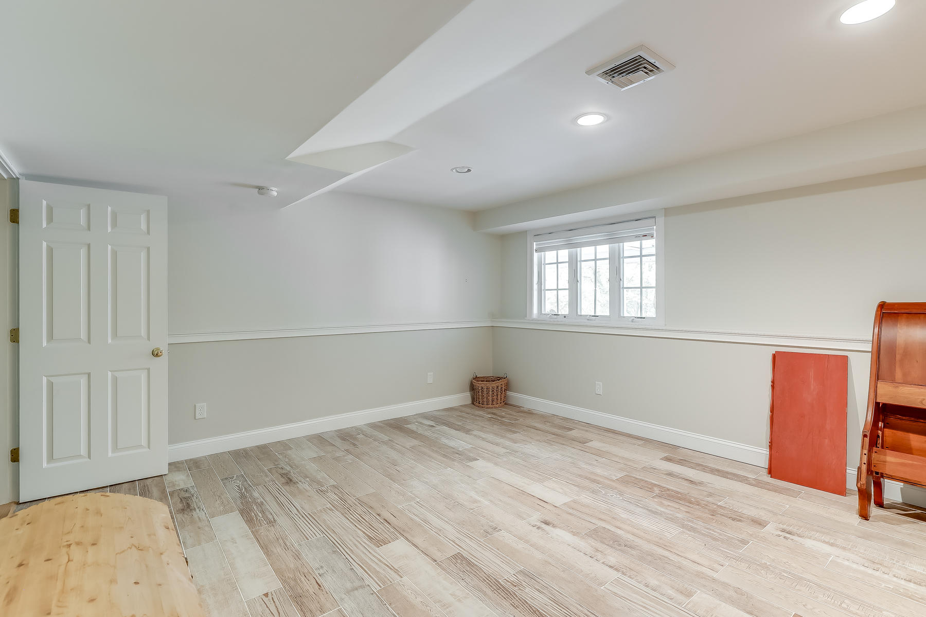 117 Wild Goose Way Centerville, MA 02632 - Photo 38 of 51 wooden floor in an empty room with a window