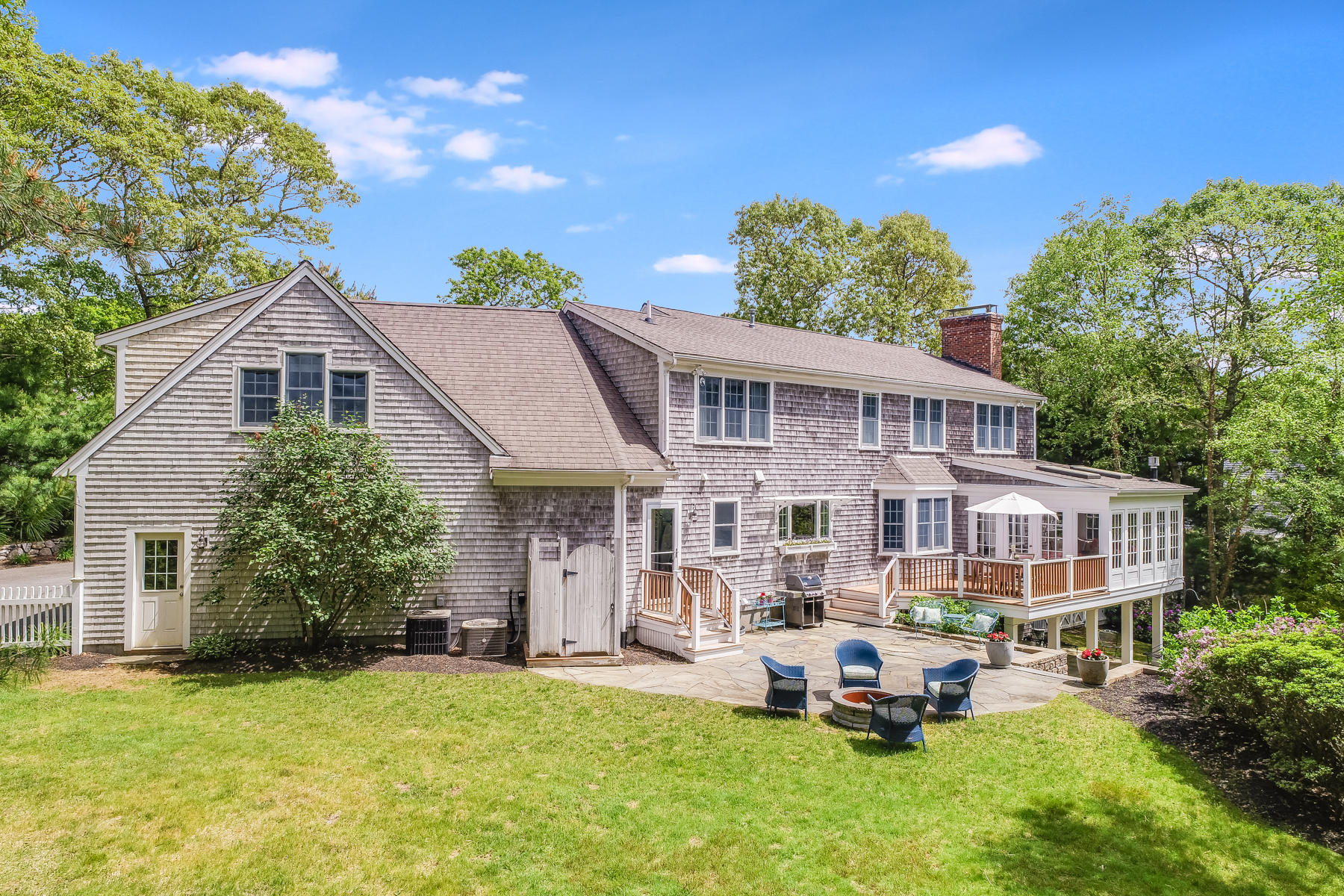 117 Wild Goose Way Centerville, MA 02632 - Photo 41 of 51 a view of a house with a patio and a yard