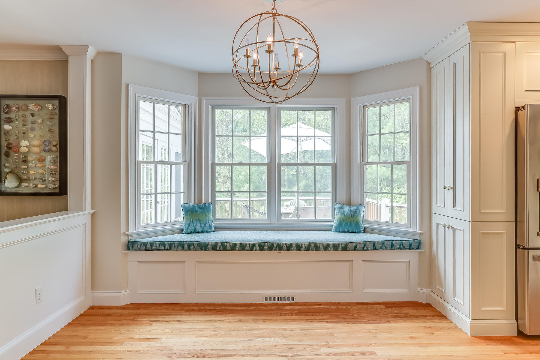117 Wild Goose Way Centerville, MA 02632 - Photo 7 of 51 a bathroom with a large window and a wooden floor
