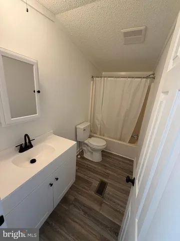 a bathroom with a sink and a tub