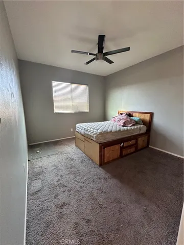 a bathroom with a double vanity sink toilet mirror and shower