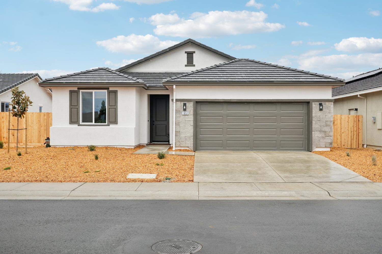 1639 Hansen Ranch Road Olivehurst, CA 95961 - Photo 2 of 33 Photo is of show home. Please see agent for colors, options and upgrades for this homesite.