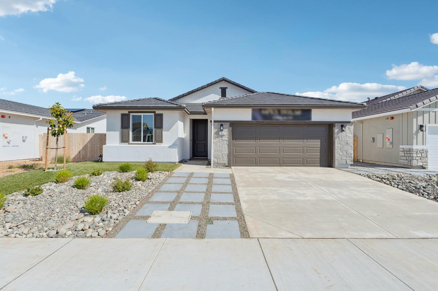 1639 Hansen Ranch Road Olivehurst, CA 95961 - Photo 2 of 35 Photo is of show home. Please see agent for colors, options and upgrades for this homesite.