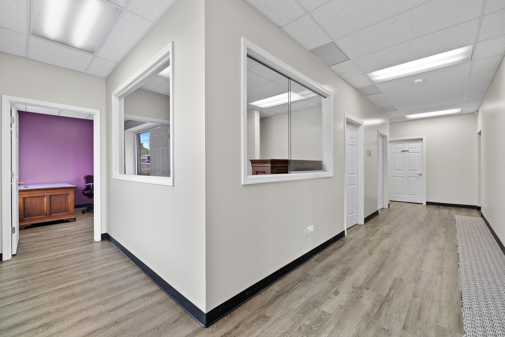 5214 State Rte 31 Crystal Lake, IL 60012 - Photo 21 of 30 a view of a hallway with wooden floor and closet