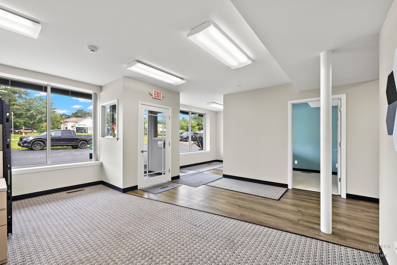 5214 State Rte 31 Crystal Lake, IL 60012 - Photo 4 of 30 a view of a big room with wooden floor and windows