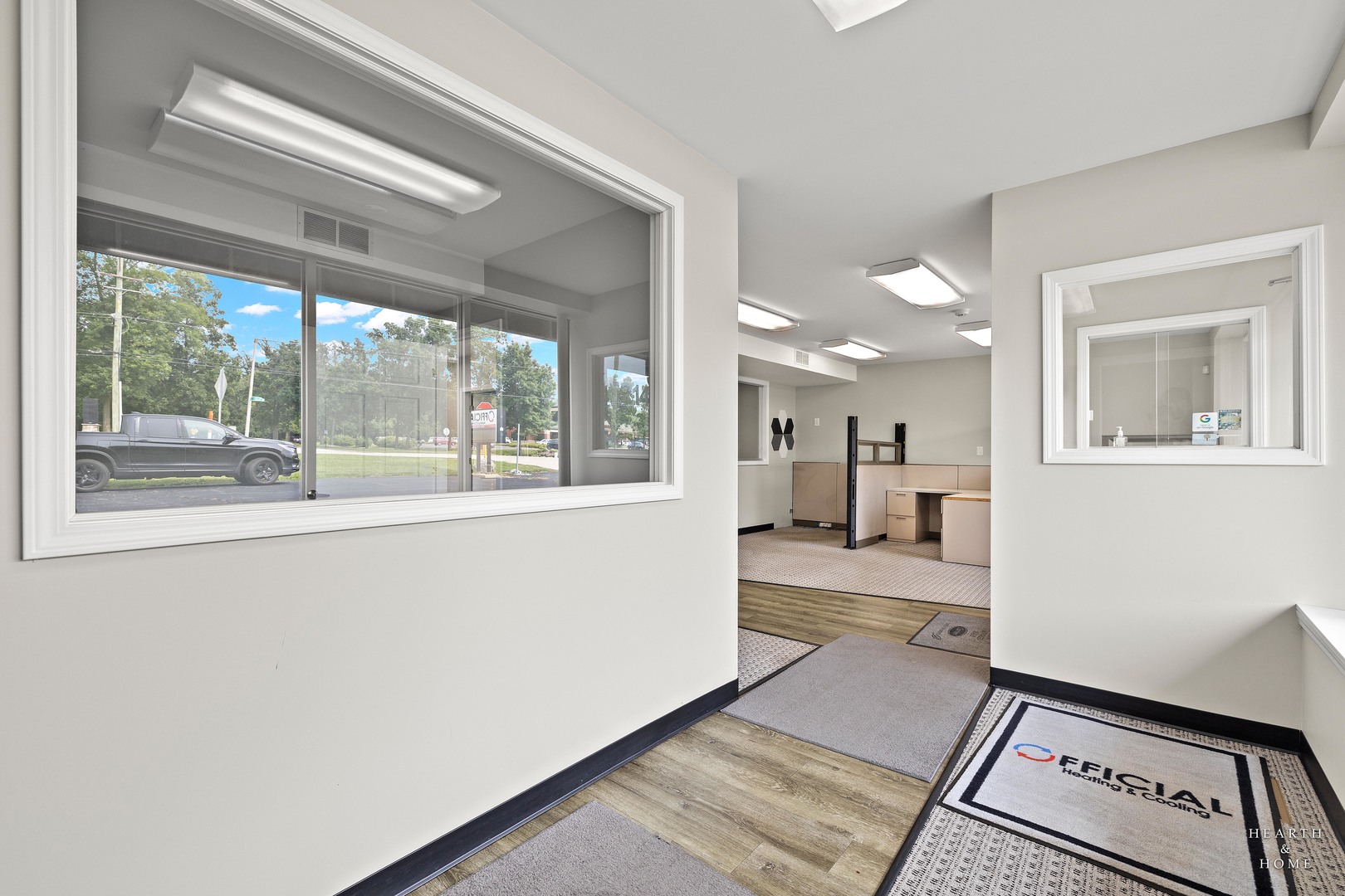 5214 State Rte 31 Crystal Lake, IL 60012 - Photo 5 of 30 a view of a hallway with a dining table & chairs in a room