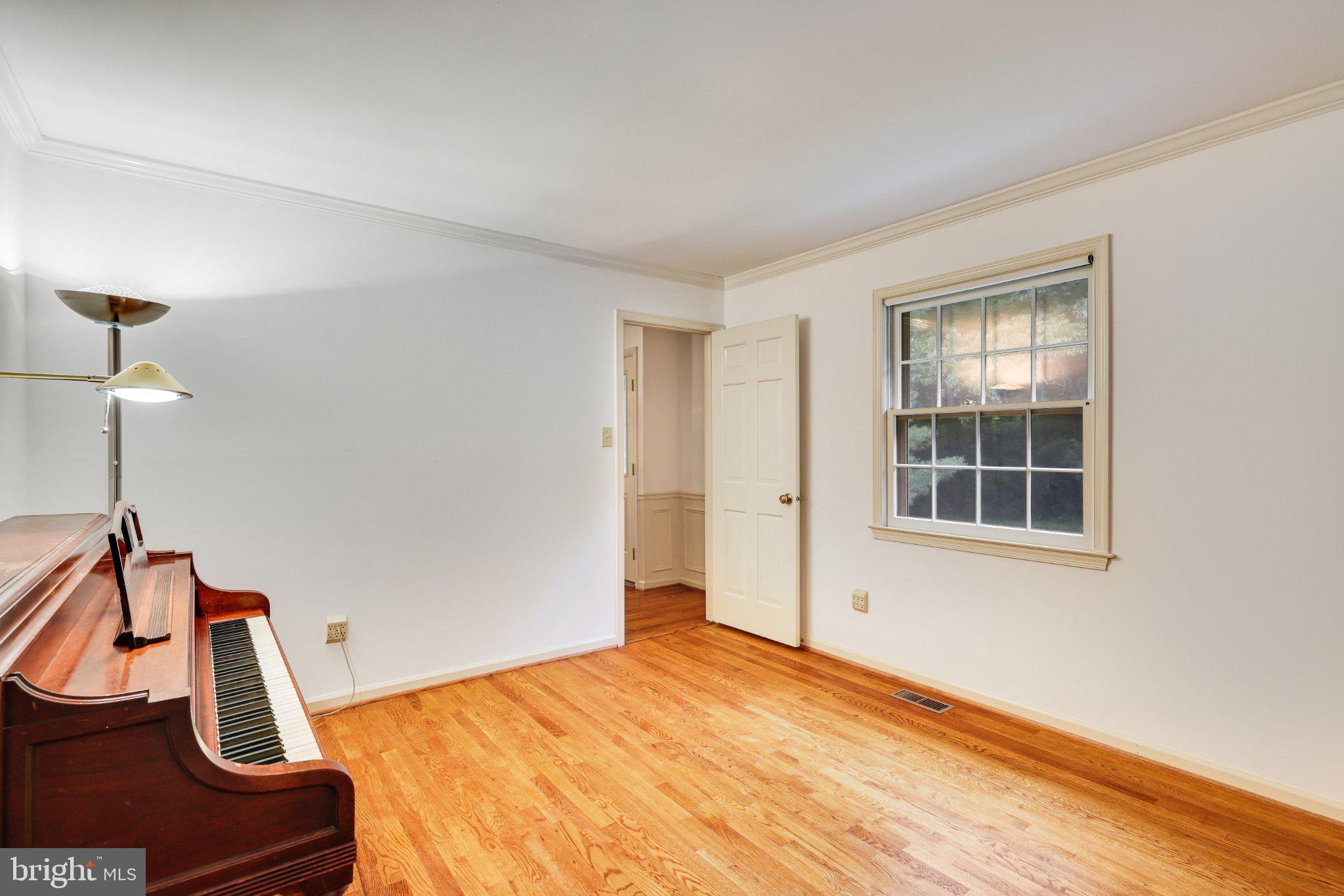 1427 Laurel Hill Road Vienna, VA 22182 - Photo 10 of 57 Bright and inviting music room.