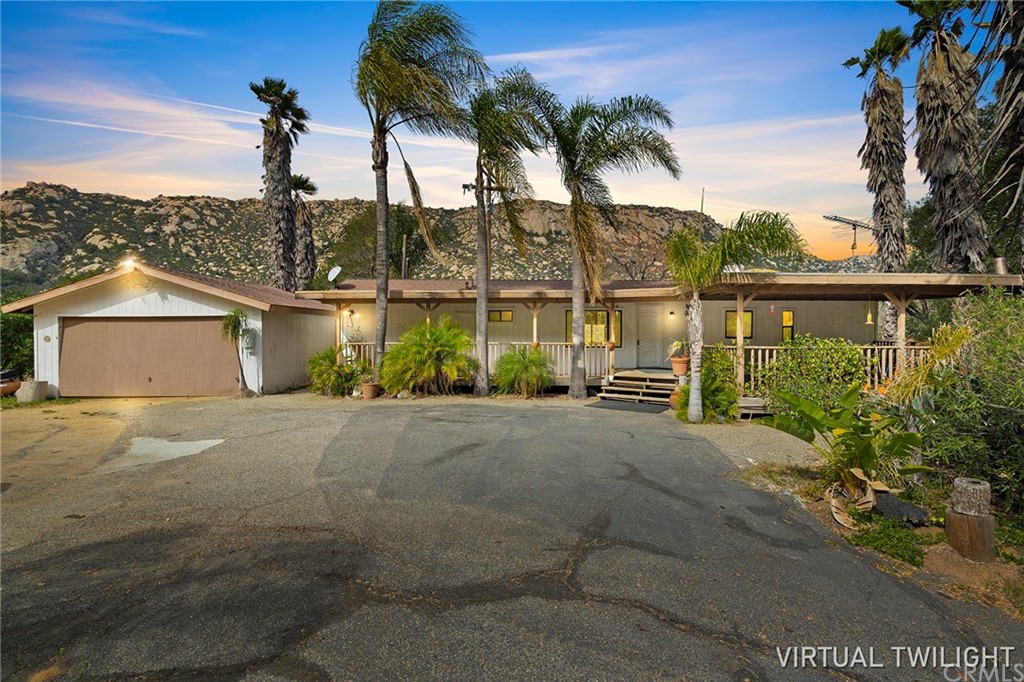 a view of a house with a lake view