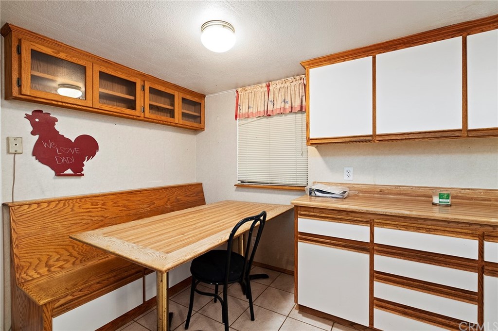 46970 Rainbow Canyon Road Temecula, CA 92592 - Photo 16 of 34 a workspace with table and chair