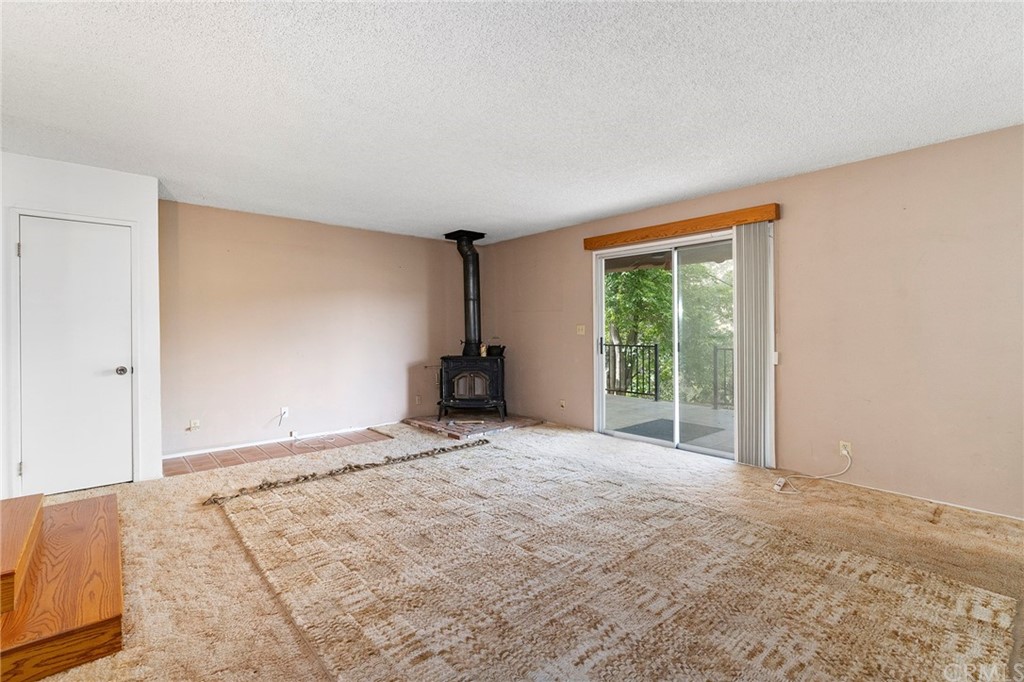 46970 Rainbow Canyon Road Temecula, CA 92592 - Photo 18 of 34 a view of an empty room with a window