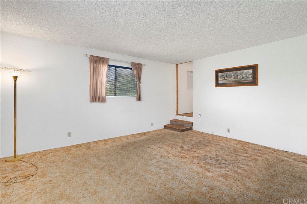 46970 Rainbow Canyon Road Temecula, CA 92592 - Photo 20 of 34 a view of an empty room with a window