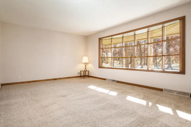 an empty room with windows