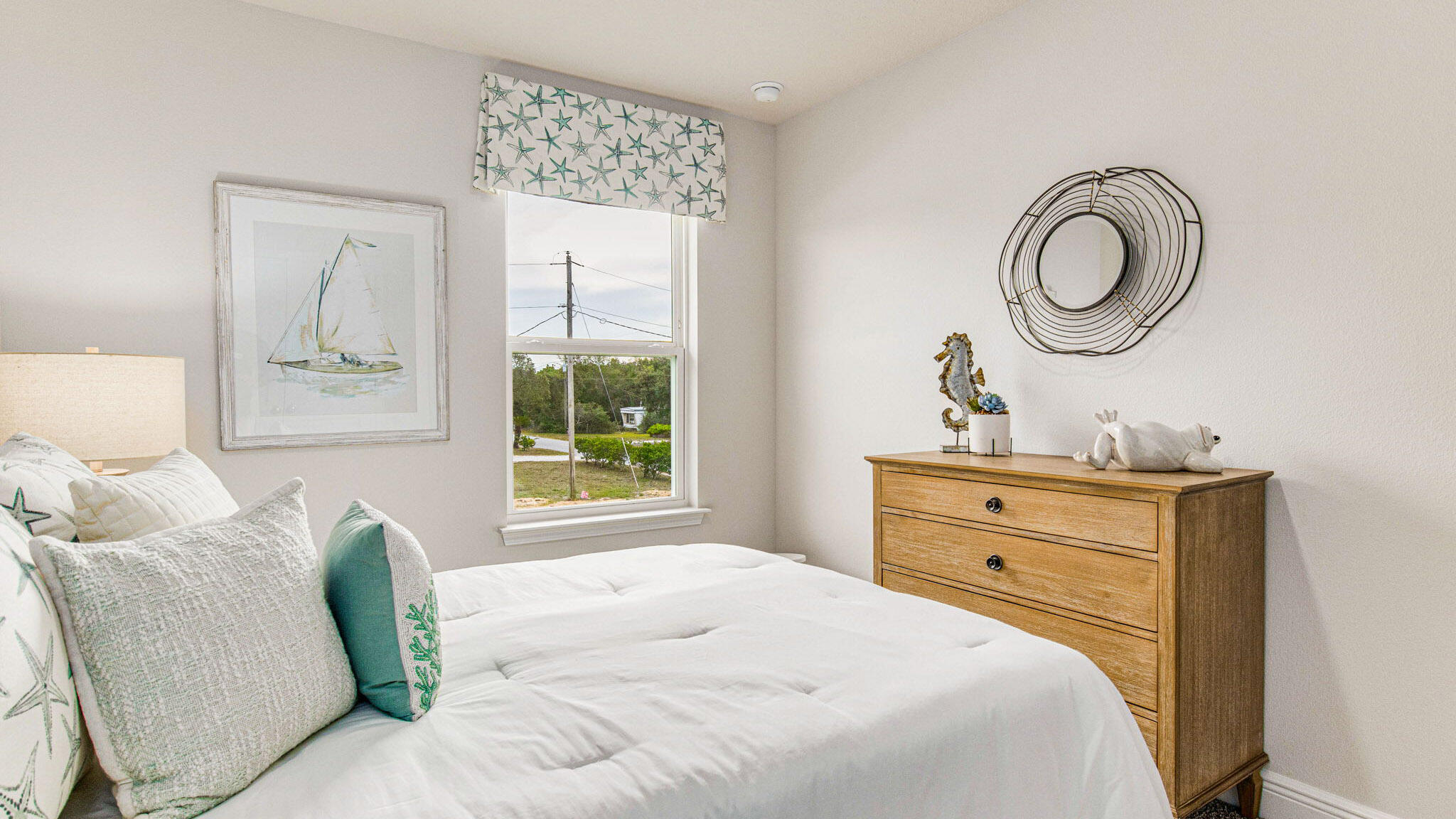 8467 Midtown Court Navarre, FL 32566 - Photo 22 of 27 a bedroom with a bed and a window