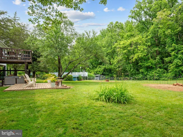 a front view of a house with garden and porch