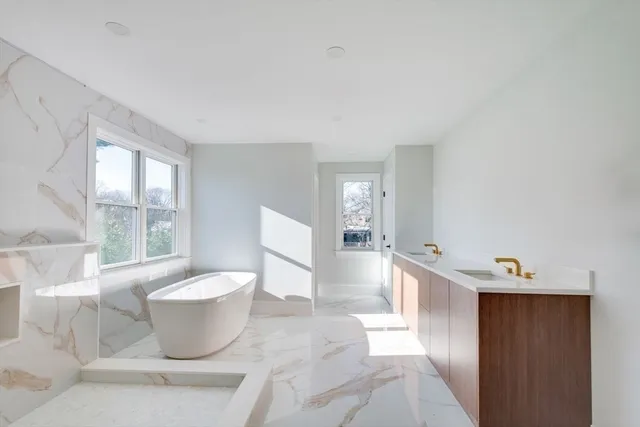 a living room with furniture and window