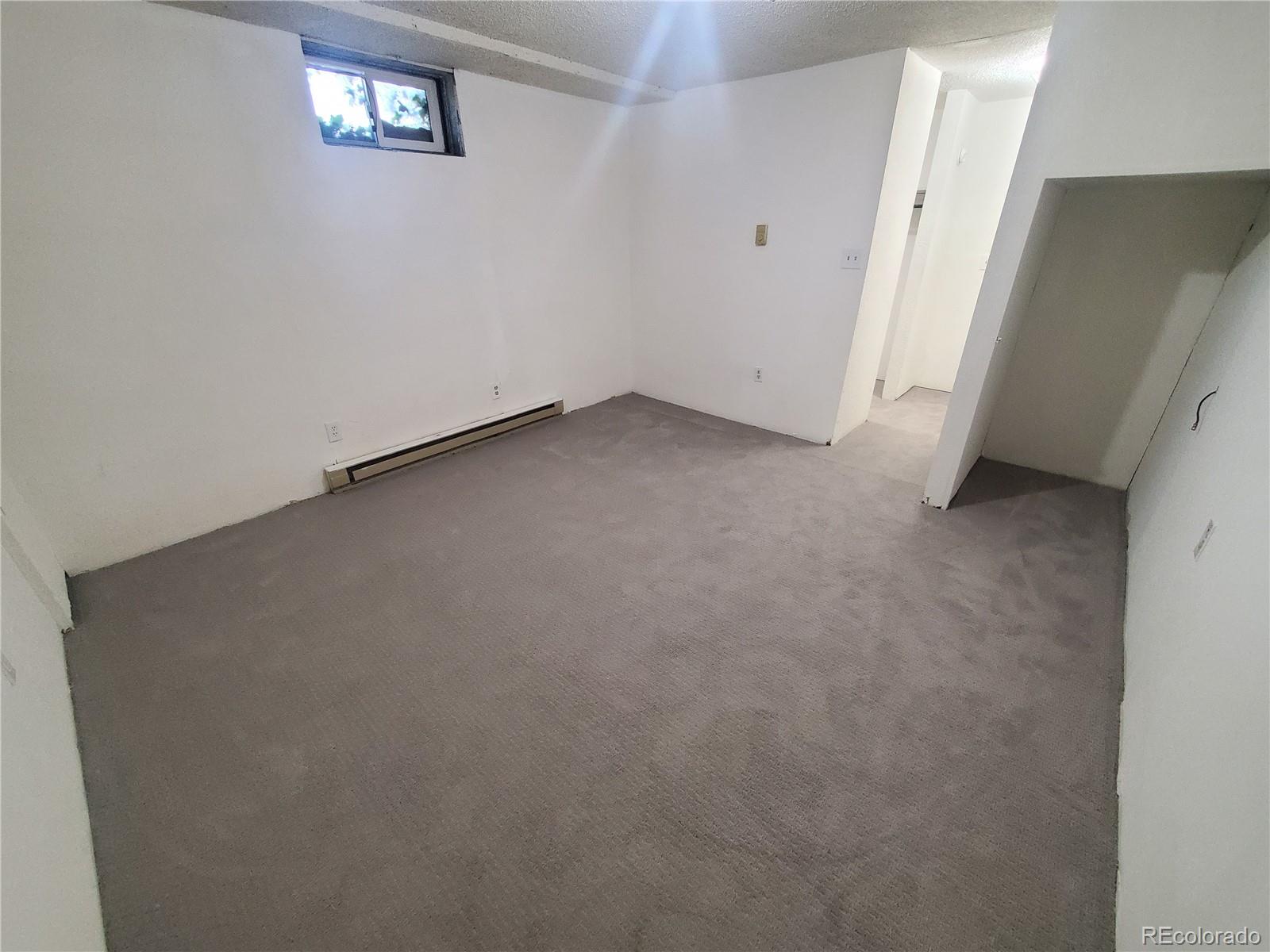 1012 State Street Fort Morgan, CO 80701 - Photo 10 of 18 an empty room with a empty space