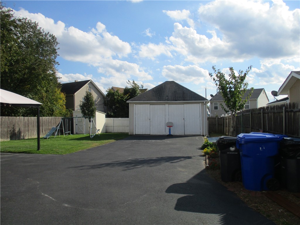 19 Gooding Street Pawtucket, RI 02860 - Photo 13 of 49 PLENTY OF PAVED PARKING IN THE BACK YARD