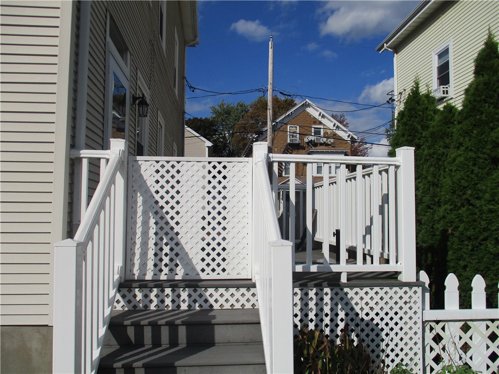 19 Gooding Street Pawtucket, RI 02860 - Photo 9 of 49 SIDE ENTRANCE TO THE BACK YARD