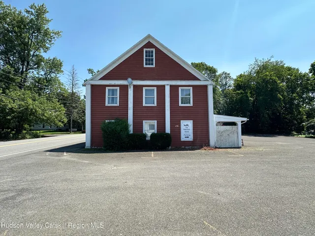 a kitchen with a stove and a microwave