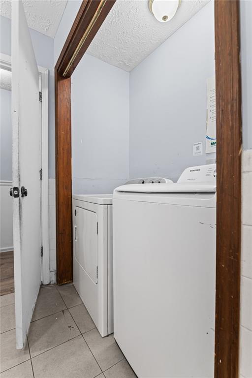 877 Beckwith Street Southwest Atlanta, GA 30314 - Photo 12 of 28 a utility room with dryer and washer