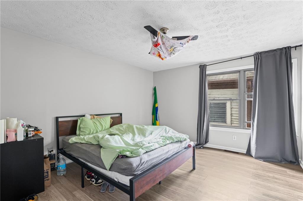 877 Beckwith Street Southwest Atlanta, GA 30314 - Photo 15 of 28 a living room with furniture and a window