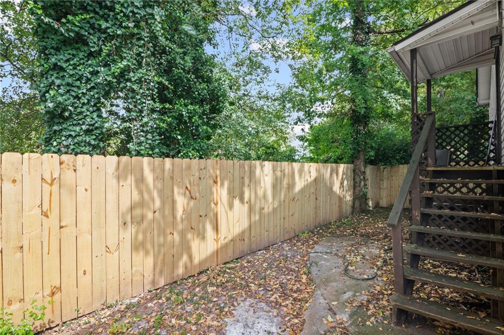 877 Beckwith Street Southwest Atlanta, GA 30314 - Photo 27 of 28 a view of a wooden fence
