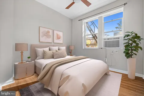 a kitchen that has a sink and a stove in it