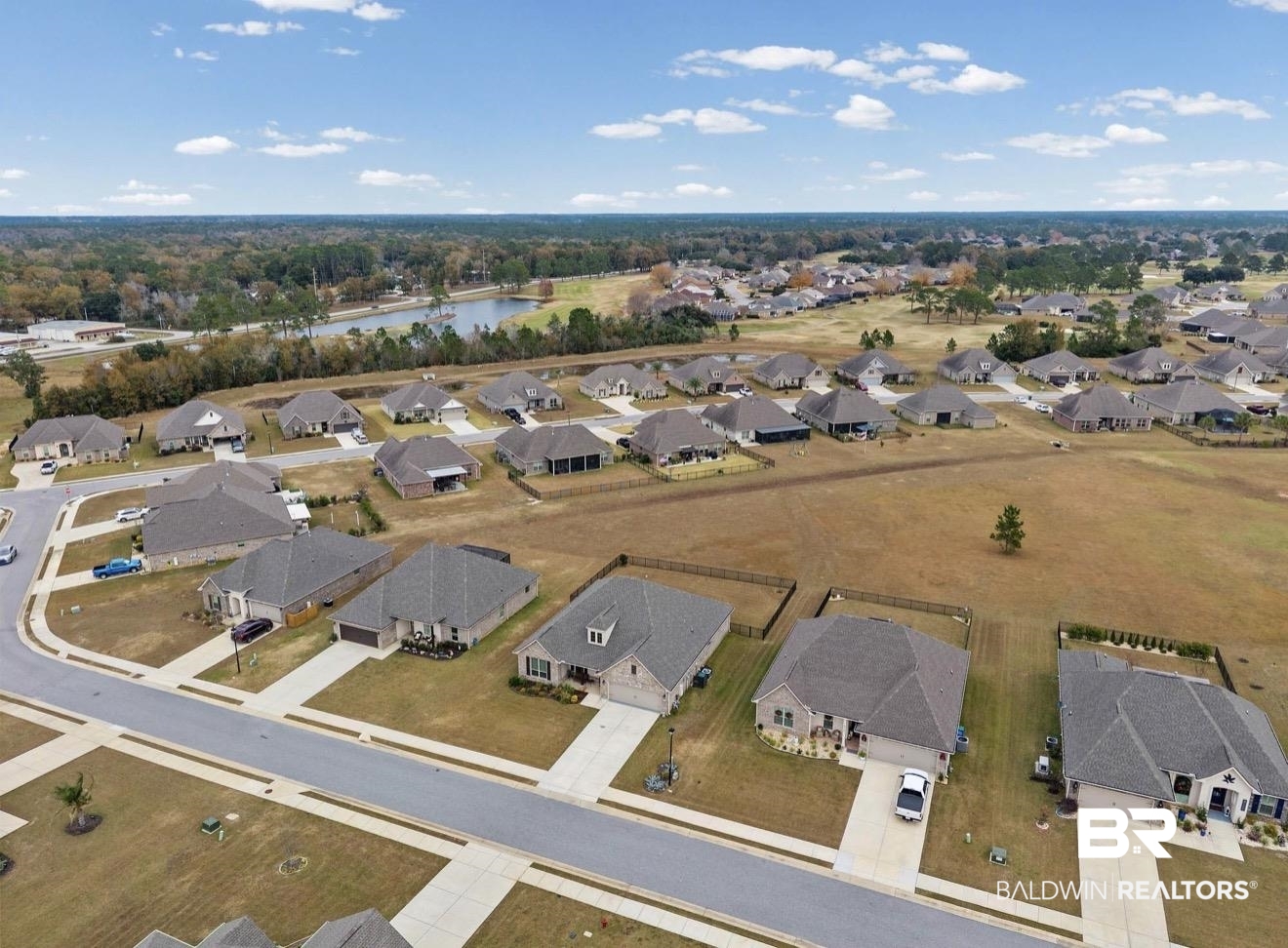 10126 Chipper Lane Foley, AL 36535 - Photo 28 of 30 Aerial view of property's location with nearby suburban area and a large body of water
