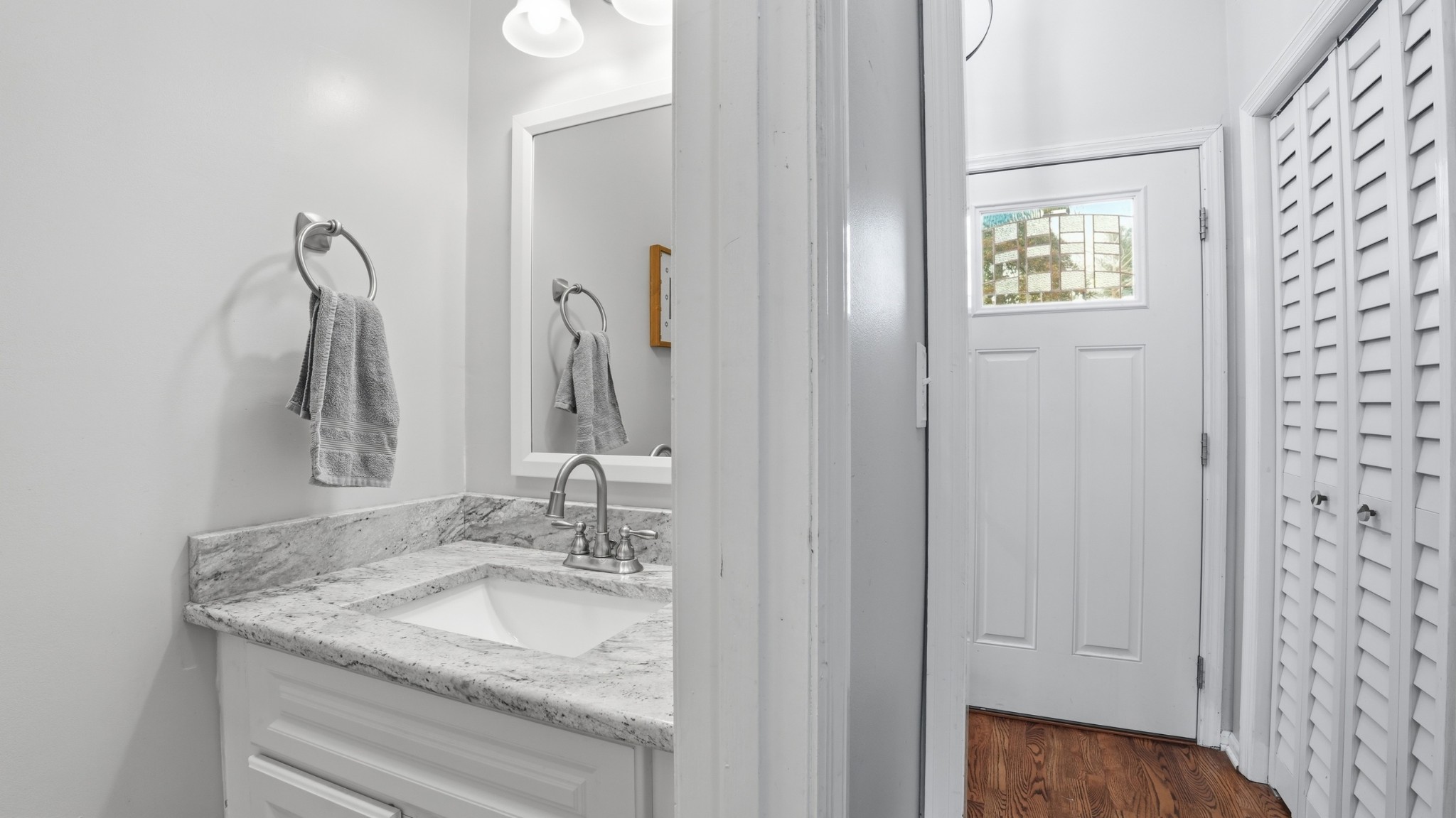 270 Wood Bluff Road Winchester, TN 37398 - Photo 36 of 55 a bathroom with a granite countertop sink and a mirror